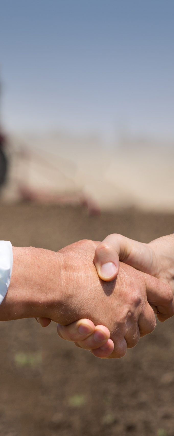 cropped-shutterstock_1072442237-Farmers-shaking-hands-scaled-7.jpg